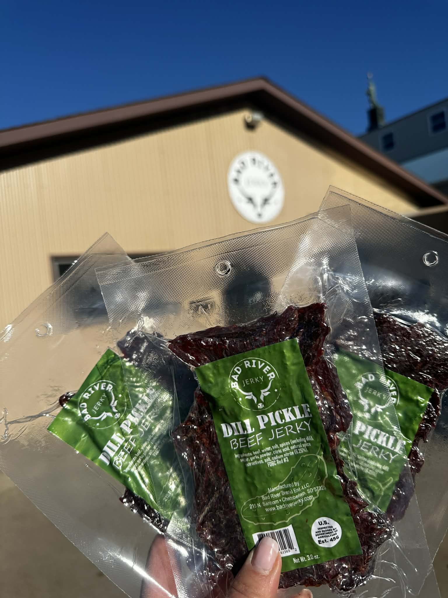 Dill pickle beef jerky pieces – tangy, savory hand-torn snack